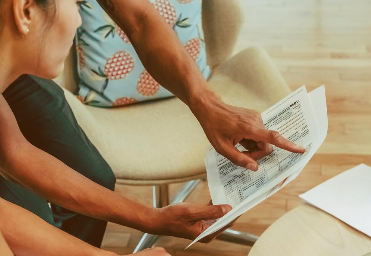 Person reviewing legal documents at home